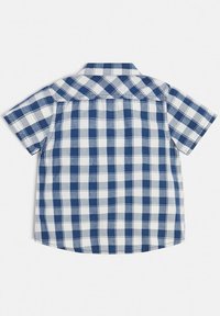 Camicia a maniche corte con motivo a quadri blu e bianchi, colletto a punte aperte e orlo curvo. Realizzata in tessuto leggero.