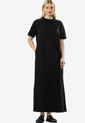 Black, short-sleeve, long dress made of smooth fabric with a round neckline and side pockets, featuring a straight fit and ankle-length hem.