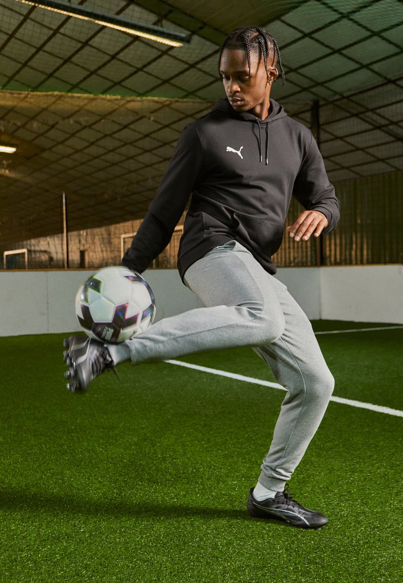 Puma TEAMGOAL CASUALS PANTS - Teplákové kalhoty - medium gray heather