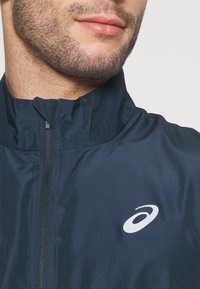 ASICS CORE JACKET - Vindjakke - french blue