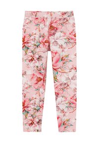 Legginsy w kwiaty w różowym materiale z wzorem dużych kwiatów z zielonymi akcentami. Wzór pokrywa całą powierzchnię legginsów.