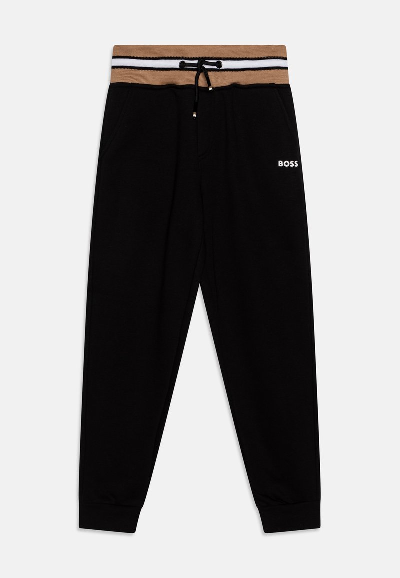 Pantalon de survêtement noir avec une ceinture élastique rayée marron et blanche, doté d'un cordon de serrage et du logo "BOSS" en blanc sur le côté.