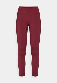 Bordó leggings, magas derékkal, rugalmas anyagból készült. Simaságot biztosító textúrával és testhezálló fazonnal rendelkezik, látható varratok nélkül.
