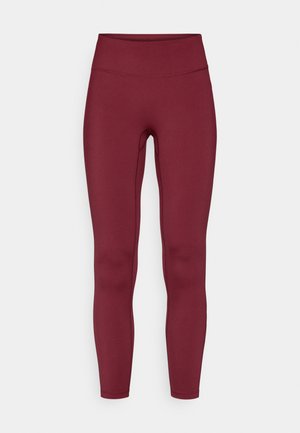 Bordeauxfarbene Leggings mit hohem Bund, gefertigt aus einem dehnbaren Material. Verfügt über eine glatte Textur und eine figurbetonte Passform ohne sichtbare Nähte.