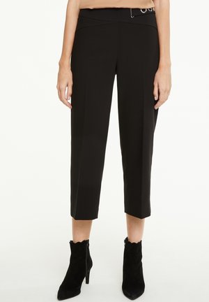 Spodnie materiałowe