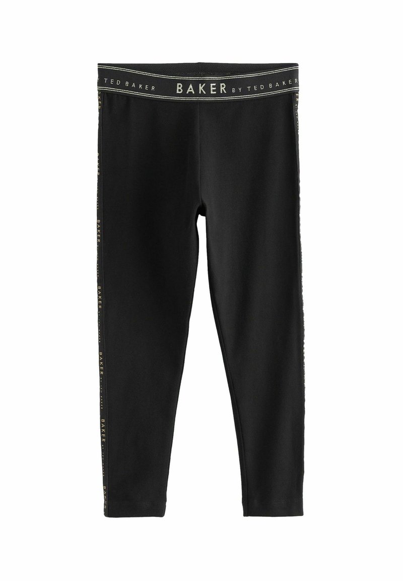 Fekete leggings, rugalmas anyagból, aranyszínű logóval az oldalon és széles derékpánttal, sima felülettel.