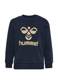 Sweat-shirt bleu marine avec un col rond à côtes et des poignets. Présente un grand logo graphique beige au centre, mettant en valeur un design stylisé.