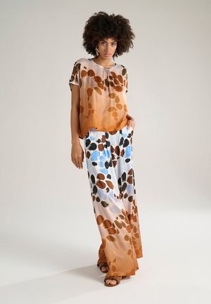 PRINTED - Trousers - rust