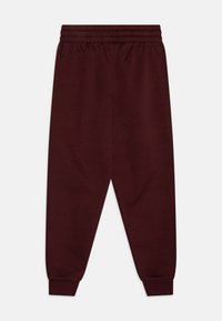 Nike Sportswear CLUB UNISEX - Treniņtērpa apakšdaļas - burgundy crush/white