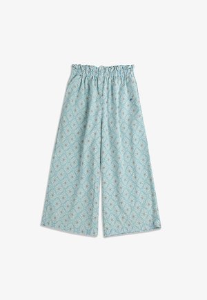 Light blue wide-leg pants with elastic waistband and a repeating white and beige floral diamond pattern.
