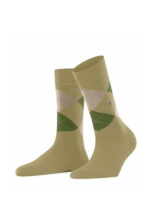 Chaussettes mi-mollet de couleur vert olive avec un motif argyle géométrique en beige clair et vert, agrémentées de discrètes surpiqûres bleues.