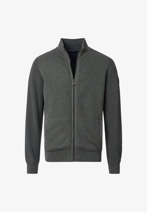 Dark green zip-up jacket with a high collar, ribbed texture, long sleeves, and side pockets. Features a smooth zipper and fitted cuffs.