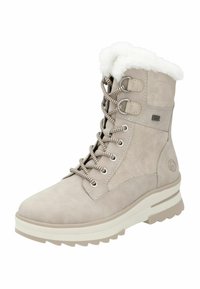 Stivaletto alla caviglia beige chiaro realizzato in morbida pelle con un colletto in pelliccia sintetica, punta rotonda e suola in gomma con battistrada profondo per una buona aderenza.