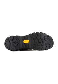 Black rubber outsole with deep treads and a hexagonal yellow accent featuring the "Vibram" logo. Textured finish for traction.