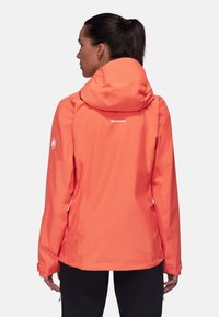 Bright orange waterproof jacket with a hood, featuring a logo at the back and adjustable cuffs, made from smooth, durable material.