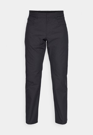 Pantalon noir, coupe slim, à la texture lisse, avec deux poches avant et des détails de couture subtils. Design ajusté pour un look moderne.