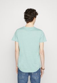 Tommy Jeans SLIM JASPE CREW NECK - T-shirt básica - turquoise