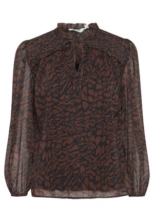 Blouse brune transparente avec un imprimé animal noir, dotée d'un col haut, d'un détail en trou de serrure et d'un smockage texturé sur les épaules. Manches longues.