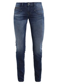Mörkblå jeans i denim med smal passform, femficksdesign och subtila blekningar på låren. Knäppning i midjan.