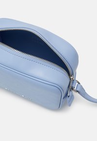 Tommy Jeans MUST CAMERA BAG - Borsa a tracolla - moderate blue
