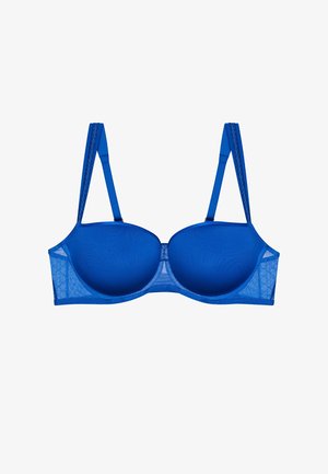 Soutien-gorge rembourré bleu avec bretelles réglables, fabriqué en tissu lisse, présentant un design sans coutures et des accents en dentelle sur les côtés.