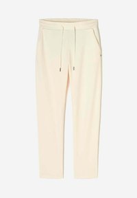 Lichte crème elastische taille joggers met drawstring, zijzakken en slanke taps toelopende benen, gemaakt van zachte stof voor comfort.