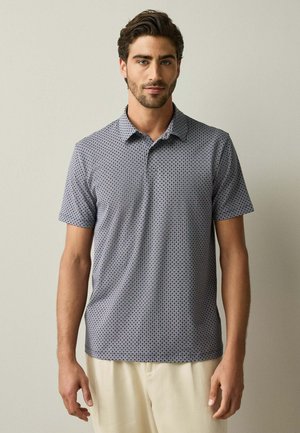 Next, - Koszulka polo
