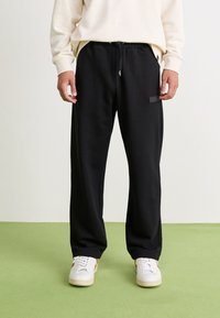 Ellesse MACCHIE - Tréningruha alsók - black