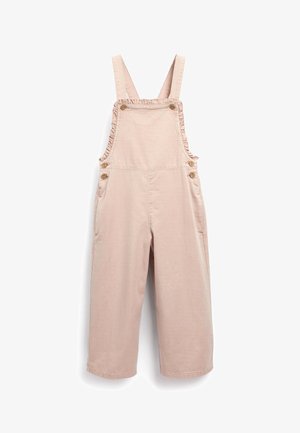 Salopette rose clair à jambes larges avec bretelles ajustables et boutons en bois, présentant un bord à volants le long des bords du panneau de poitrine.