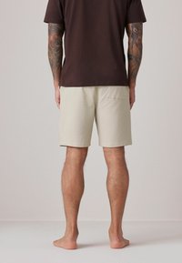 Next STAG - Donji dijelovi trenirke - bone cream textured