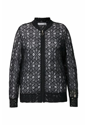 Veste bomber en dentelle noire avec un motif floral, fermeture éclair, col montant, et poignets et ourlet côtelés pour un look texturé.