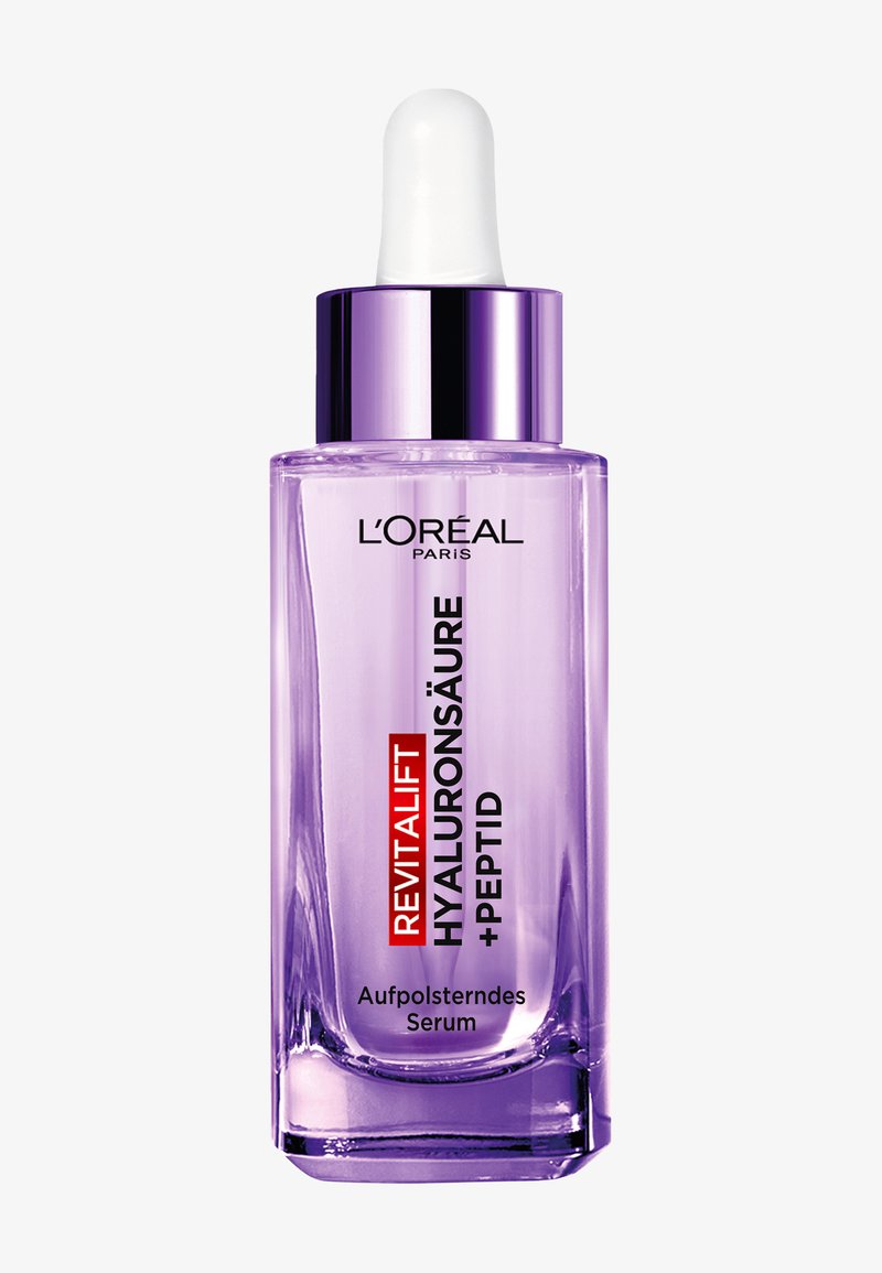 L'Oréal Revitalift Hyaluronzuur + Peptide serum in een doorzichtige paarse druppelfles met zilverkleurige dop, gelabeld voor huidverstrakking.