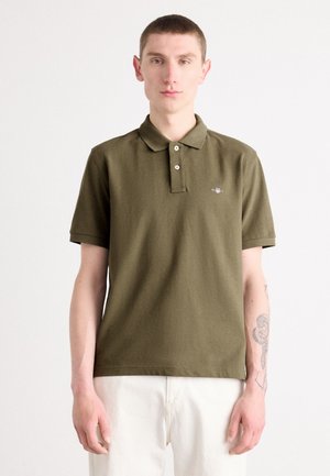 - Koszulka polo