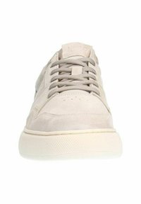 Beige suede sneakers with a rounded toe, flat lace-up design, textured rubber sole, and minimalistic stitching detail.