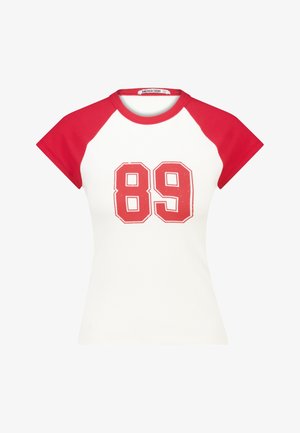 White fitted t-shirt with red raglan sleeves, featuring a large, distressed number "89" print on the front. Ribbed texture throughout.