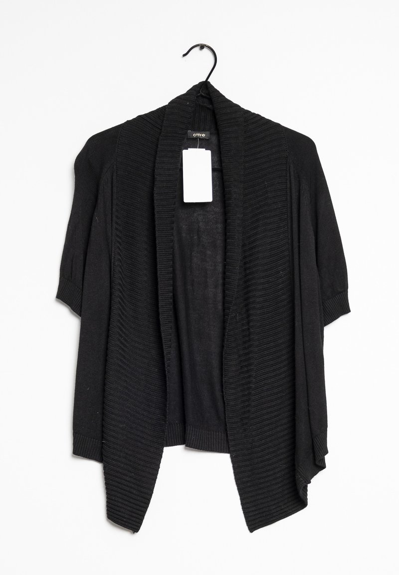 Cardigan noir à manches courtes, ouvert sur le devant, avec col châle côtelé, suspendu à un cintre noir avec une étiquette blanche vierge attachée au col.