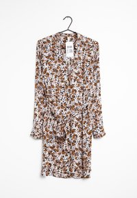 Květinové letní šaty s dlouhými rukávy v odstínech růžové, hnědé a bílé. Obsahují zavazovací pas a jemné květinové vzory po celém povrchu.