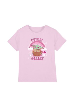 Pink cotton t-shirt featuring a cartoon character with green skin and large ears, graphics with text "CUTEST IN THE GALAXY" and rainbow elements.