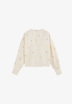 Blusa cremosa de manga larga con escote en V, botones en la parte delantera y bordado floral dorado disperso en el cuerpo y las mangas.