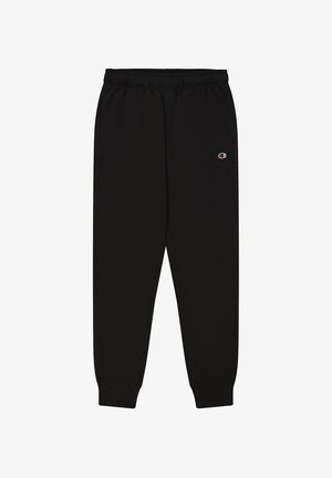 Pantaloni della tuta neri realizzati in tessuto morbido, con cintura elastica e caviglie a costine. Presentano un piccolo logo sulla coscia sinistra.