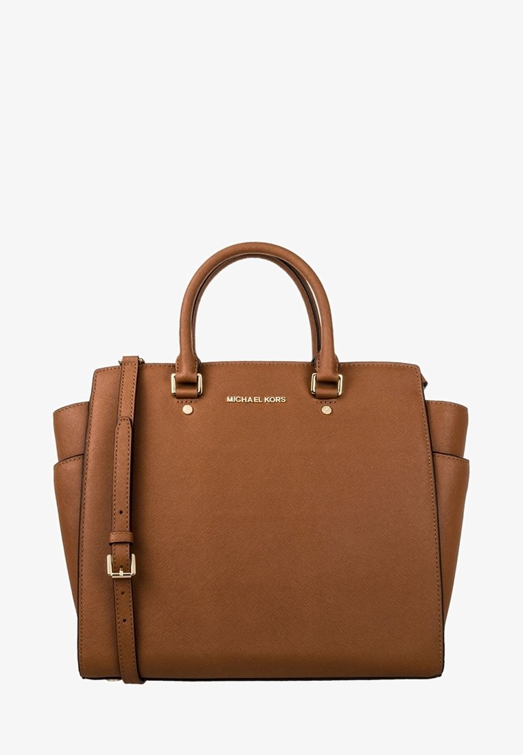 Sac à main structuré en cuir marron avec double poignée, bandoulière ajustable et logo Michael Kors doré sur le devant.