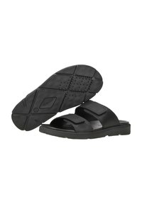 Sandales noires à glissière avec deux brides réglables, dessus en synthétique et semelle texturée avec des trous de ventilation pour la respirabilité.