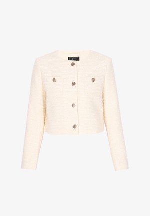 Krém színű, texturált, rövidített kabát hosszú ujjakkal, elülső fém gombokkal és két mellzsebbel.