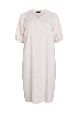 Gaiši beigs kleita, izgatavota no mīksta, teksturēta auduma. Tam ir V veida kakla izgriezums, īsas pūkainās piedurknes un brīva, līdz ceļgaliem garuma siluets.