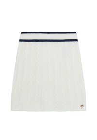 Jupe en tricot blanche avec motif en relief, dotée d'une ceinture rayée bleu marine. Inclut un petit accent de logo doré près de l'ourlet.