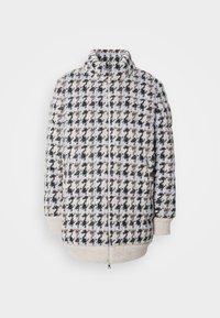 Gestepptes Jacket mit hohem Kragen, das ein mehrfarbiges Hahnentritt-Muster in den Farbtönen Schwarz, Braun und Hellblau zeigt. Mit Reißverschluss.