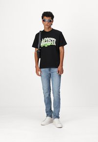 Lacoste Apdrukāts T-krekls - black