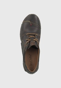 Scarpa di pelle marrone con punta rotonda e dettagli cuciti. Design con lacci caratterizzato da lacci beige. Parte superiore testurizzata con rivestimento interno liscio.