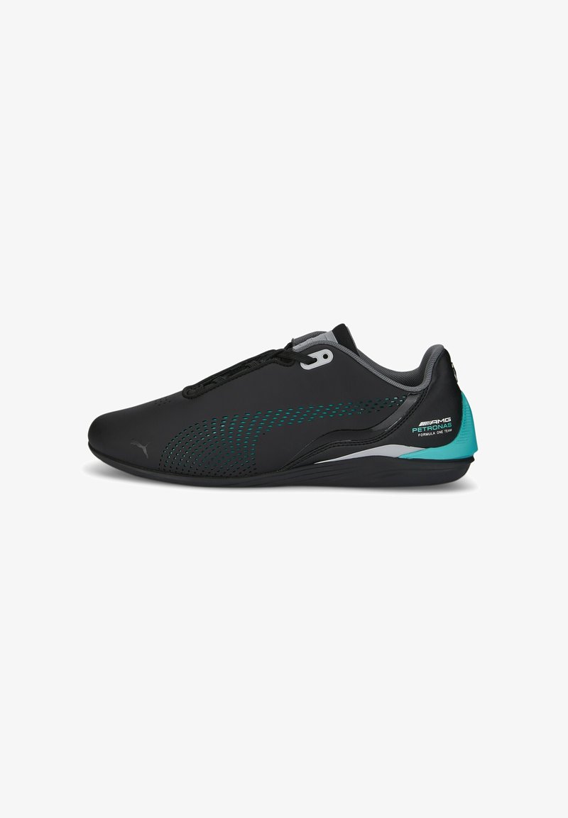 Chaussures de sport noires avec des détails en maille, des accents turquoise et un design épuré. Elles présentent un système de laçage et un col rembourré.