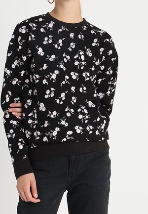 Svart blommig sweatshirt med en blandning av rosa och vita blommor, ribbade ärmslut och nederkant, samt en klassisk rund halsdesign.